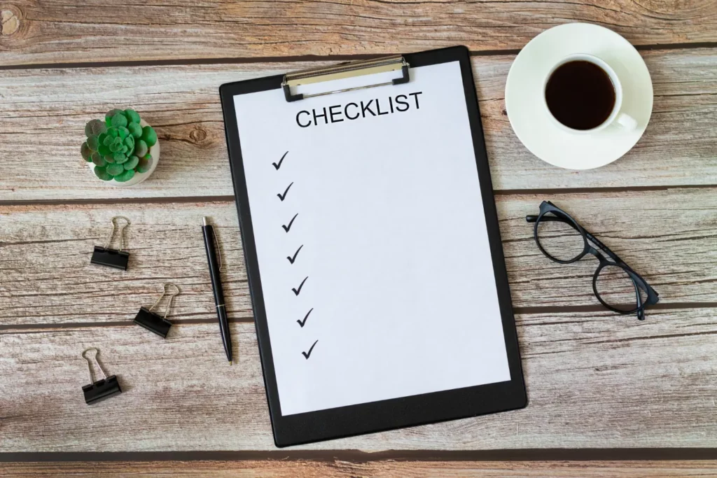 Completed website conversion rate checklist on digital tablet for WordPress optimization.